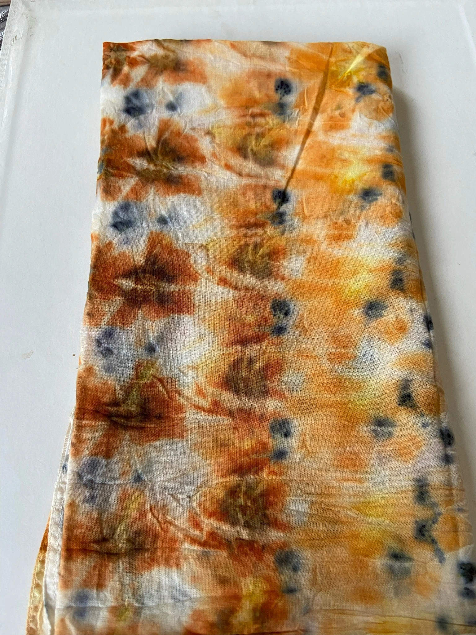 Orange, sienna and blue organic cotton bandanas